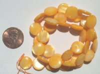 16 inch strand of 10mm Orange Mother of Pearl Disks